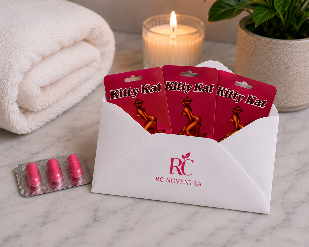 Kitty Kat products in red packaging with RC Noventra branding on a marble surface.
